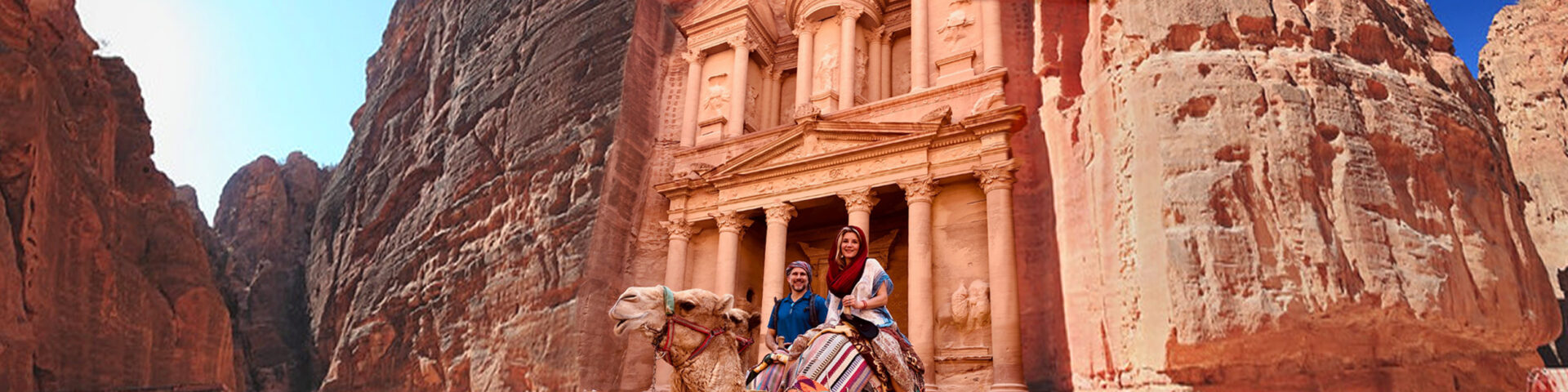 Daniel and Megan riding Camels in Petra Jordan